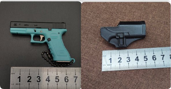 Miniature Gun Keychain That Fully Disassembles