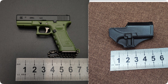 Miniature Gun Keychain That Fully Disassembles