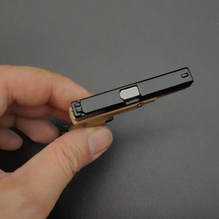 Miniature Gun Keychain That Fully Disassembles