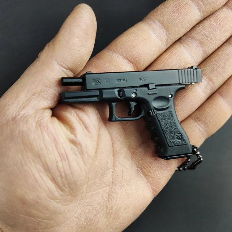 Miniature Gun Keychain That Fully Disassembles