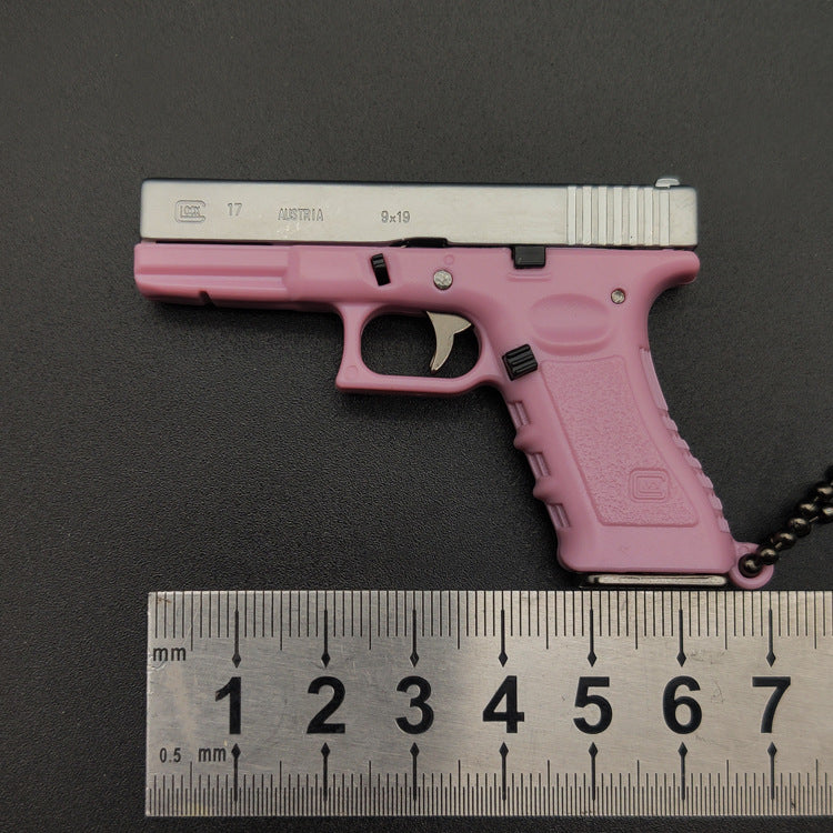 Miniature Gun Keychain That Fully Disassembles