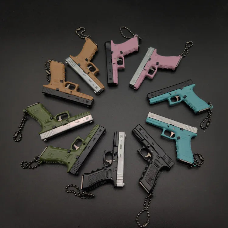 Miniature Gun Keychain That Fully Disassembles