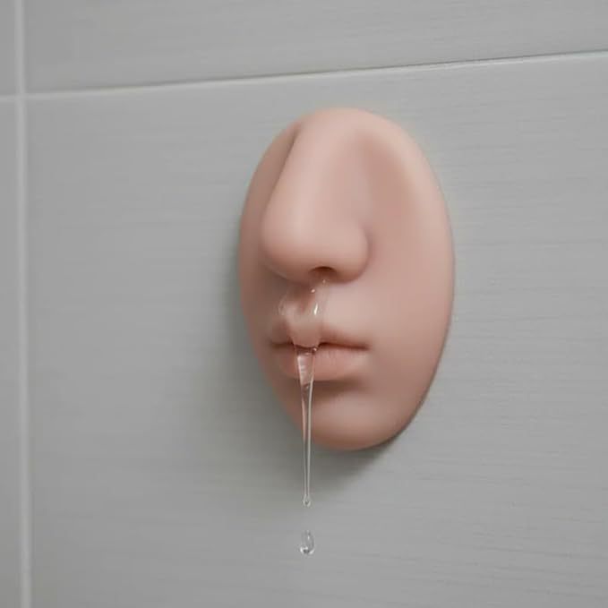 Nose Soap Dispenser That Oozes From a Nostril