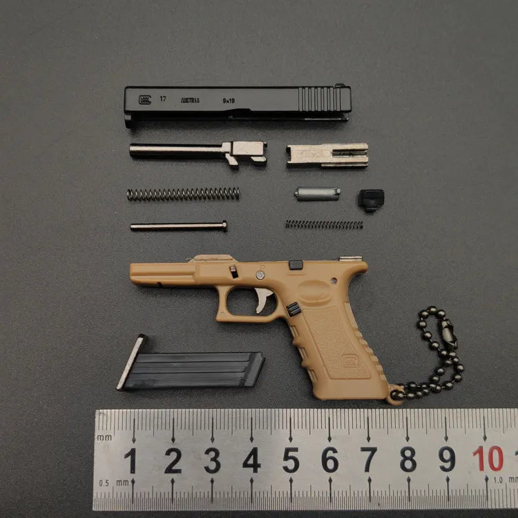 Miniature Gun Keychain That Fully Disassembles