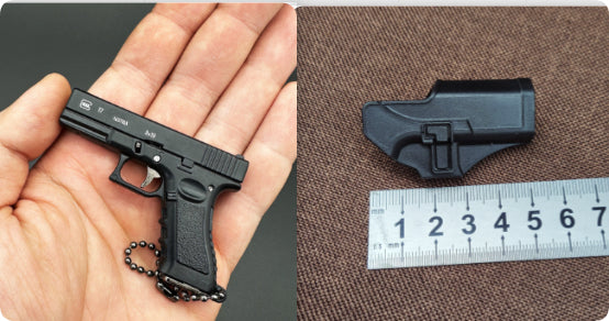 Miniature Gun Keychain That Fully Disassembles