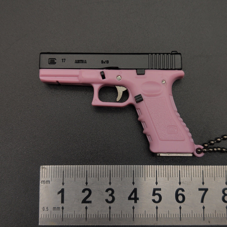 Miniature Gun Keychain That Fully Disassembles