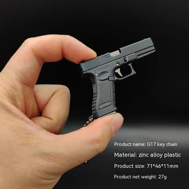 Miniature Gun Keychain That Fully Disassembles